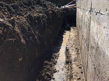 Excavation for installing a French drains